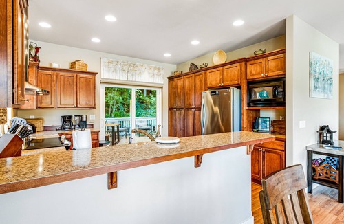Port Angeles East House | Spacious ocean-view home with forest stream, hot tub, & private community beach