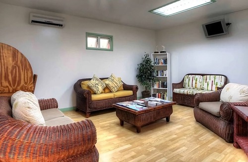 Rendezvous House | Spacious One Bedroom w/Living Area | Convenient Hotel Near Worthing Beach