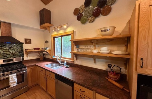 Suttons Bay Ski Chalet | Spacious, Private Suttons Bay Oasis in the Woods