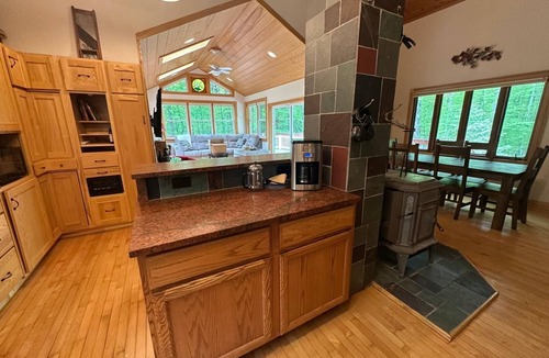 Suttons Bay Ski Chalet | Spacious, Private Suttons Bay Oasis in the Woods