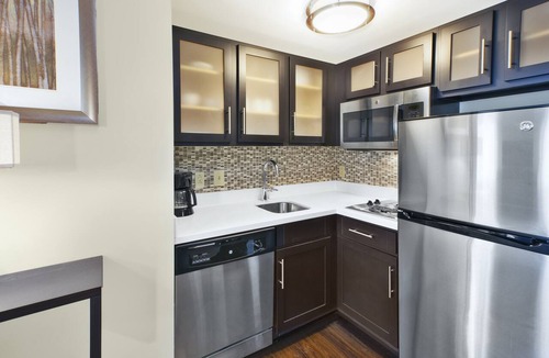 Mayfield Heights Apartment | Spacious Queen Studio | 24-Hour Business Center, Fitness Center + Free Daily Breakfast