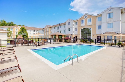 Mayfield Heights Apartment | Spacious Queen Studio | 24-Hour Business Center, Fitness Center + Free Daily Breakfast