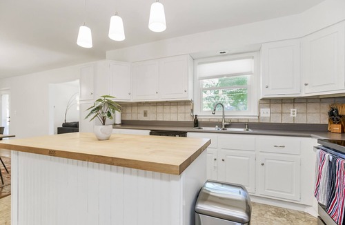 Olathe House | Spacious Ranch with Movie Room, Ping Pong, Putting Green, and Private Yard