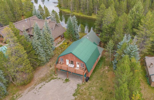 Island Park Cabin | Spacious Riverfront Cabin with Hot Tub, Fire pit, Near Park