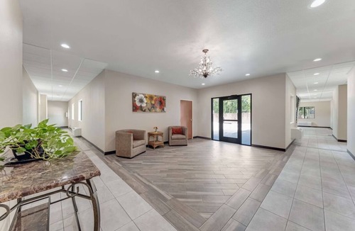 Eastside Promise Neighborhood Hotel | Spacious Room Perfect for Families w/Complimentary Breakfast - Off I-10 & I-35