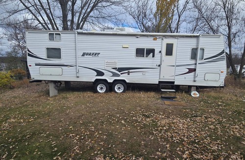 Cornell House | Spacious RV Rental Sleeps 8 — Full Kitchen, A/C, Fire Ring & Picnic Area