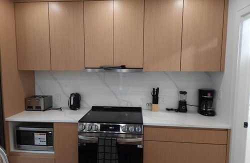 Renfrew-Collingwood Condo | Spacious Sophistication: 2-Bedroom Townhouse