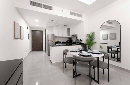 Jumeirah Village Circle Apartment | Spacious Studio Apartment with Balcony that Sleeps 4