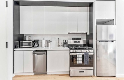 Central Park South Apartment | Spacious Studio with Charming Juliet Balcony
