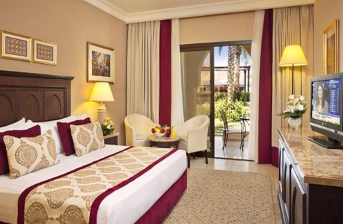 Al Aqah Hotel | Spacious, Sun-Filled Room with Pool Access – Enjoy a Peaceful Beach Retreat