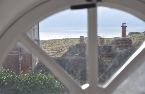 West Lulworth Cottage | Spacious Thatched Cottage in Lulworth Cove, Dorset. Sleeps 10. 5 min walk to sea
