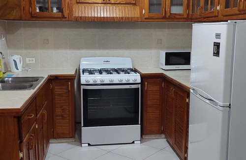 Mangrove Apartment | Spacious two bedroom apartment, 6 to 8 minutes drive from the airport