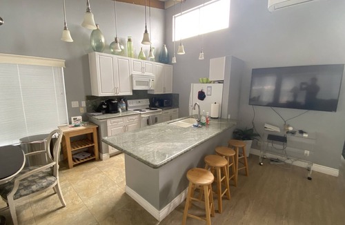 Balboa Island Condo | Spacious upper unit with partial water view four houses from North Bay Front