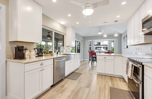 Marco Island Villa | Spacious Waterfront Villa Heated Pool Canal Walk to Beach Top Dining
