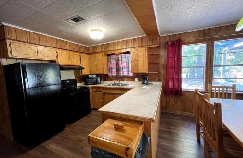 Zwolle House | Spacious Waterfront Cabin with Stocked Pond Views & Resort Amenities near Zwolle, Louisiana