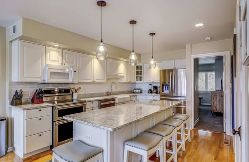 South Beach Villa | Spacious waterview haven with decks, firepit, AC, WiFi, pool - walk to beach