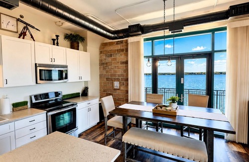 Sandusky Condo | Spacious Wrap Around Patio Incredible Views Lake Erie Cedar Point!