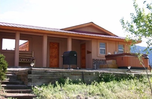 Howard House | Spanish Ranch on the Arkansas River- enjoy the rushing river from the Hot tub!