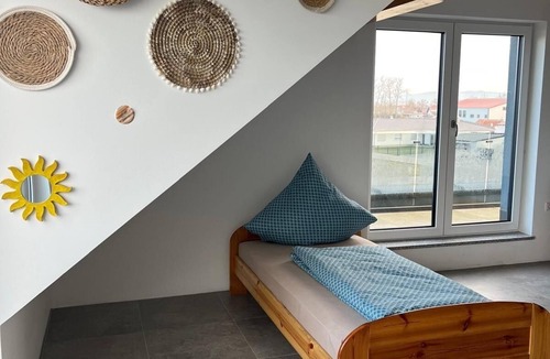 Wallersdorf Apartment | Spectacular top floor gallery apartment w. Dream panorama & excellent terrace.