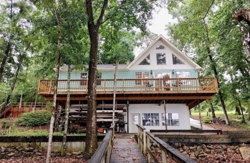 Fort Gaines House | Spectacular Upscale Romantic Charming Lakefront A-Frame Chalet with Vineyard.