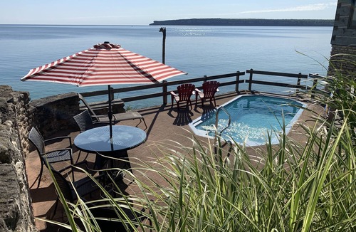 Lion's Head Cottage | Spectacular views- Stone Cottage, steps to the water, heated pool, pet friendly
