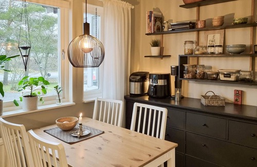 Hedekas House | Spend an unforgettable vacation in this inviting cottage with outdoor hot tub!