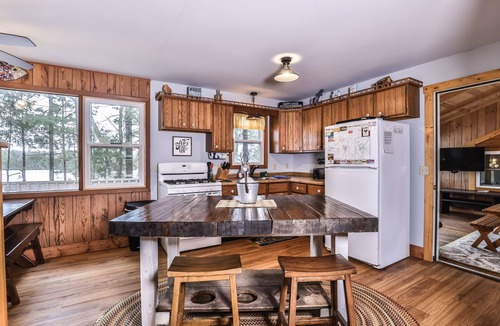 Three Lakes House | Splendid lakefront home with deck, private W/D, fireplace, and patio area