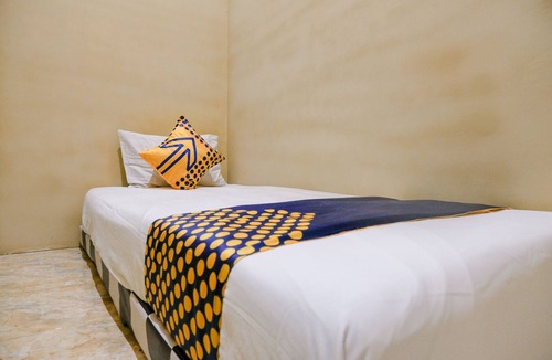 Dinoyo Hostel | SPOT ON 2387 Bukit Cemara Tidar Family