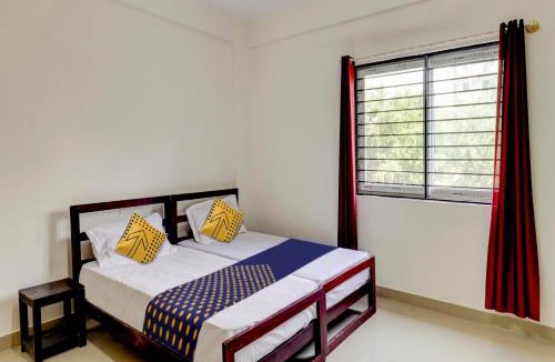 HSR Layout Hotel | SPOT ON Helloworld HSR Castle De Monte