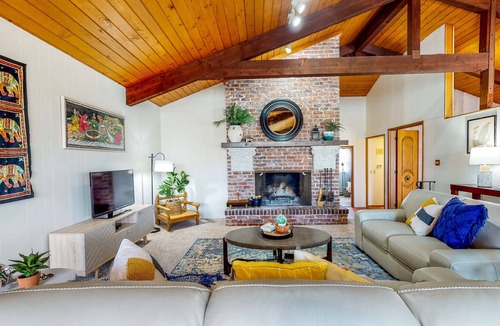 Centralia House | Sprawling and colorful lakefront home with patio