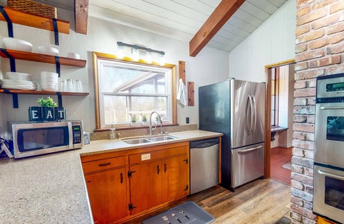 Centralia House | Sprawling and colorful lakefront home with patio