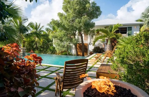 Current House | Sprawling Caribbean Beachfront Estate - Multiple Suites- Private Manicured Beach