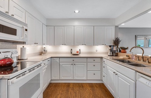 Olympia House | Sprawling lakefront property with kayaks, large deck, game table, & fireplace