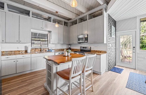 Temple Crest House | Sprawling river view estate with game room dock kayaks grill and fishing gear