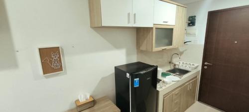 Pinang Apartment | Springwood Modern Comfort Studio