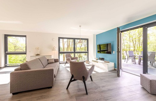 Krakow am See Apartment | Star vacation apartment "Waldkauz" with roof terrace and view of Lake Krakow