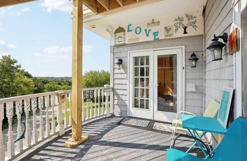 Fort Atkinson Villa | Starlight Tower Hot Tub King Suite with 8-Jet Massage Shower by RedAwning