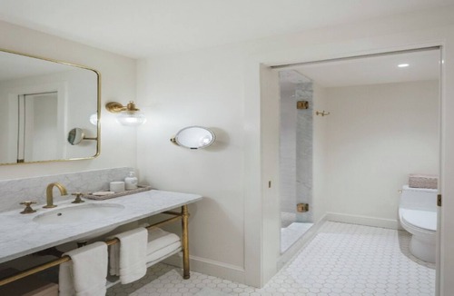 Irvington Hotel | Start Your Day w/Relaxing Views from Your Veranda–Experience a Tranquil Retreat