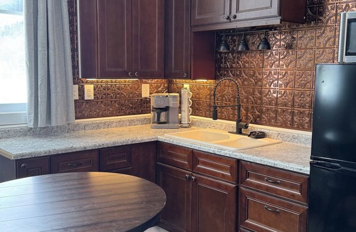 Wolverine House | Stay at this train depot built in 1906 renovated with modern amenities.
