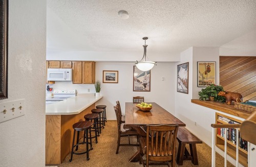 Four O'Clock House | Stay at Winterpoint 20 and walk to Main Street!
