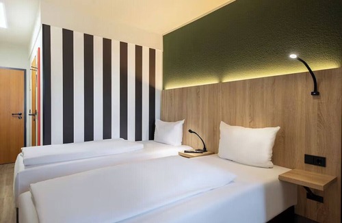 Stuttgart Hotel | Stay in a Convenient, Well-Appointed Room | Porsche Museum Just 0.4 mi Away