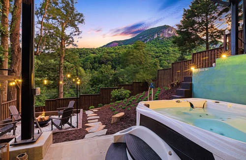 Chimney Rock Cabin | StayInOurSpace- Romantic getaway with views, walk to downtown, Hot tub, fire pit
