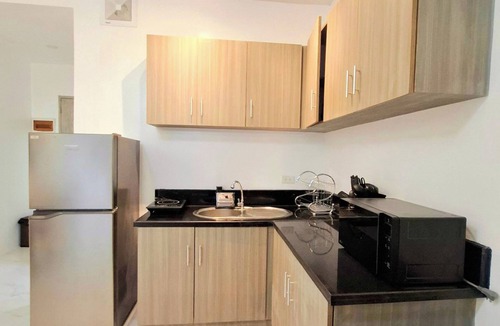 Ermita Night District Apartment | StayLuxia Studio with Kitchen, Sofabed, WiFi, Pool Netflix AC in vibrant Manila