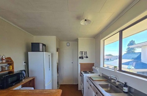 Pukehina House | Step Back in Time – Retro Beachfront Bach at Pukehina
