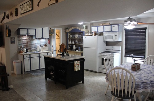 Eudora House | Step Back In Time to a charming 2-bedroom lower level house in adorable Eudora