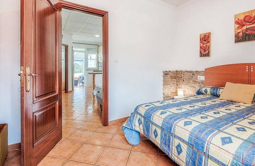 Merexo Apartment | Step into a practically equipped vacation apartment, close to picturesque stretches of coastline and