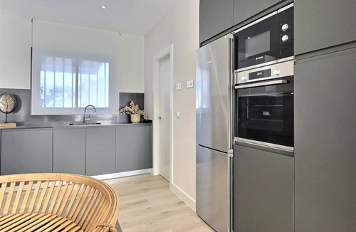 San Roque House | Step into elegance with this three-bedroom luxury modern frontline golf townhouse