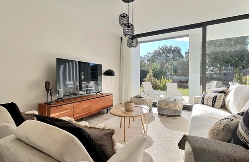 San Roque House | Step into elegance with this three-bedroom luxury modern frontline golf townhouse