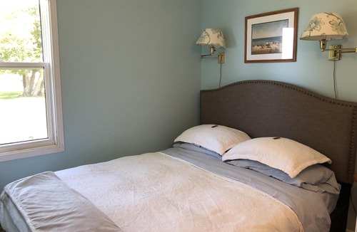 Colpoys Bay Cottage | Step out the door to the gentle lapping shore of Pike Bay!