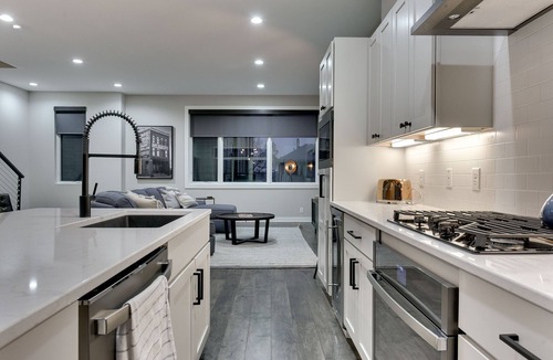 Dahlman House | Steps from Downtown Omaha! Rooftop firepit & luxury accommodations